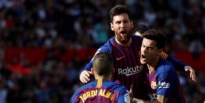 Els jugadors del Barça celebren el gol de Messi contra el Sevilla.