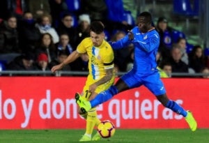 Hernán Pérez i Amath lluiten per una pilota durant el Getafe-Espanyol.