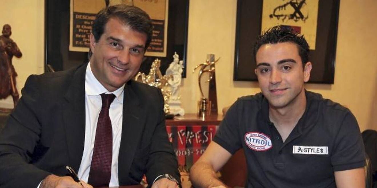 Xavi Hernàndez i Joan Laporta, en arxiu | FC Barcelona