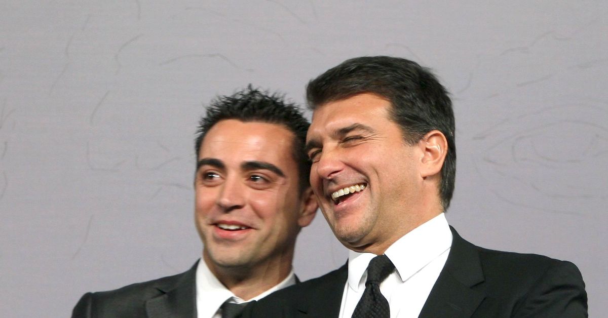 Xavi Hernàndez i Joan Laporta, en arxiu | EFE