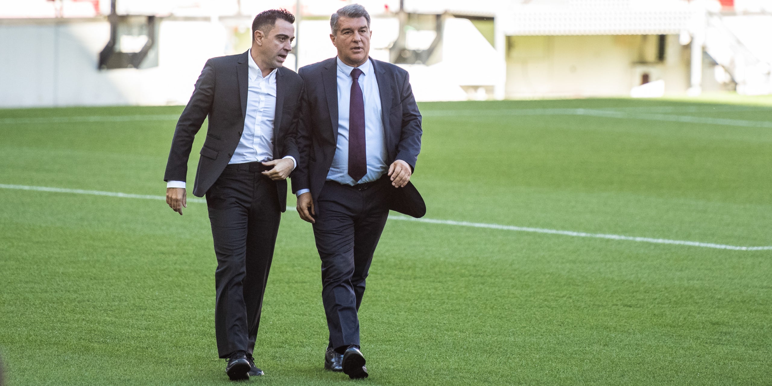 Xavi Hernández i Joan Laporta, durant la presentació de l'entrenador | Europa Press