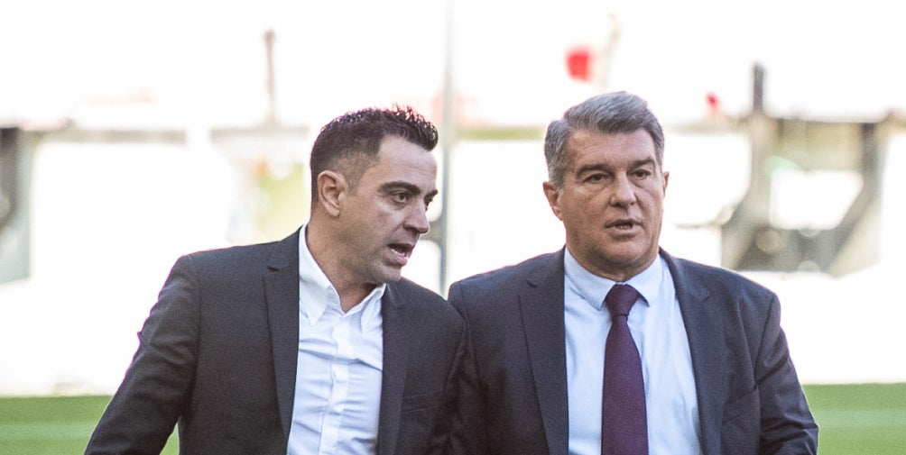 Xavi Hernández i Joan Laporta durant la presentació del tècnic | Europa Press