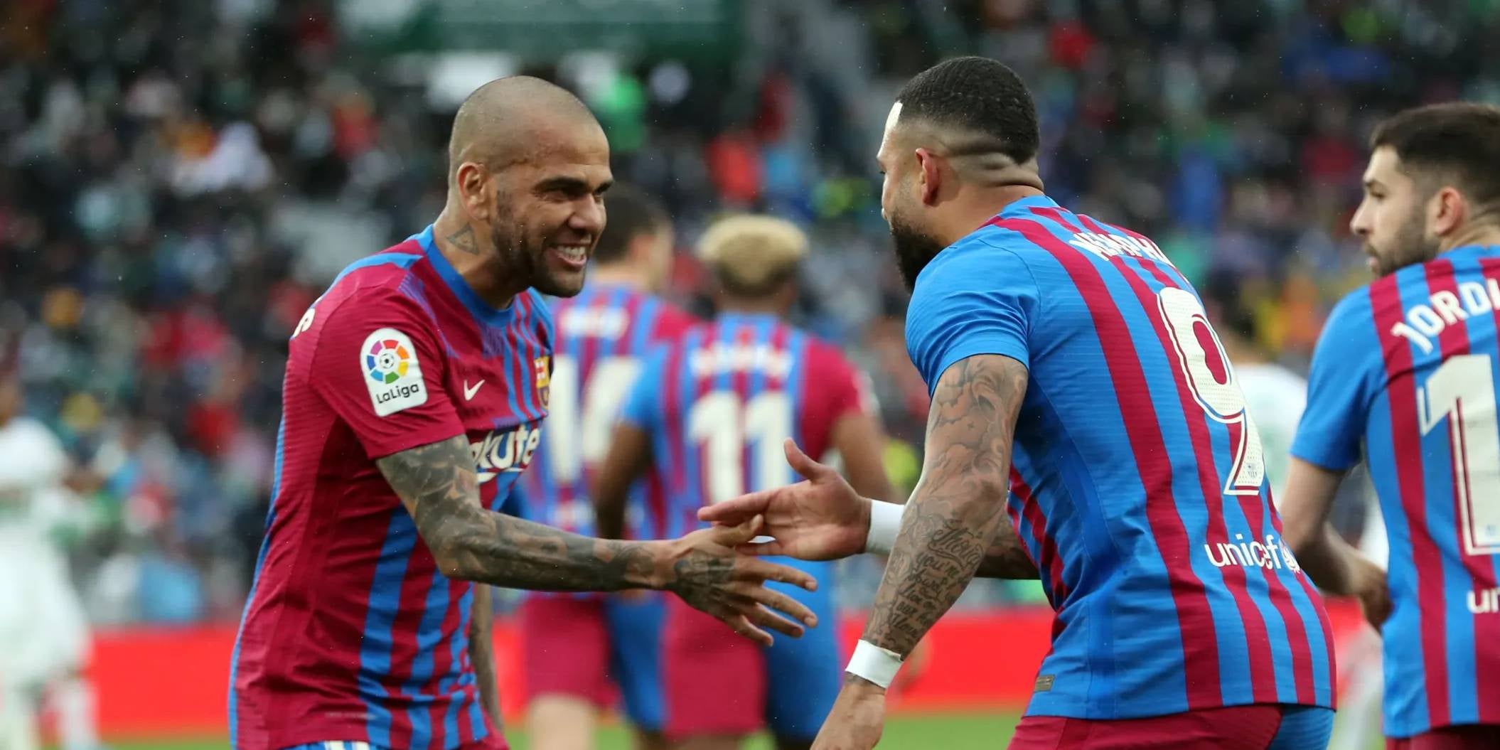 Alves i Memphis celebren un gol | FC Barcelona