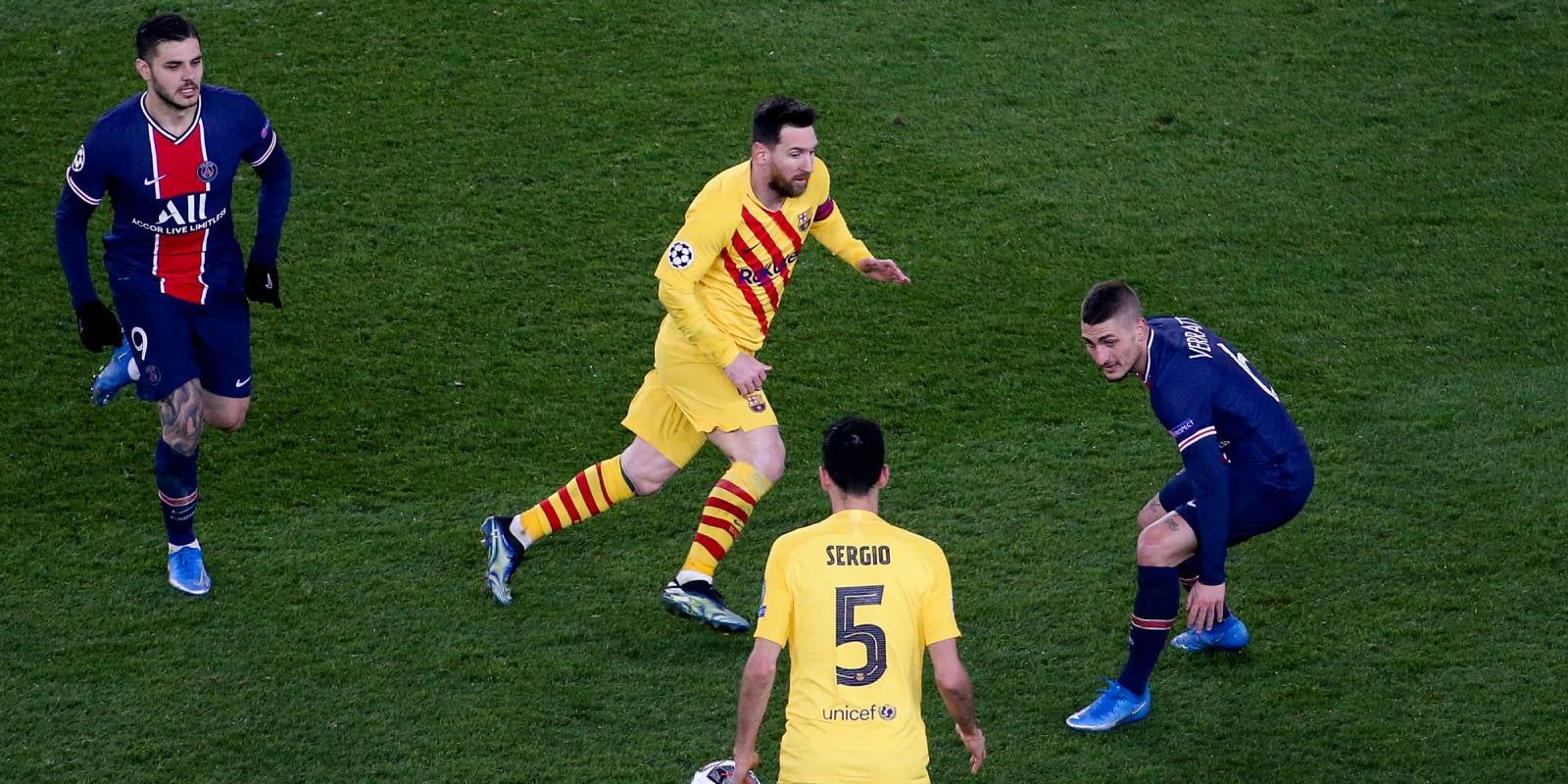 Leo Messi i Sergio Busquets, durant el PSG-Barça de la temporada 2020/2021 | Europa Press
