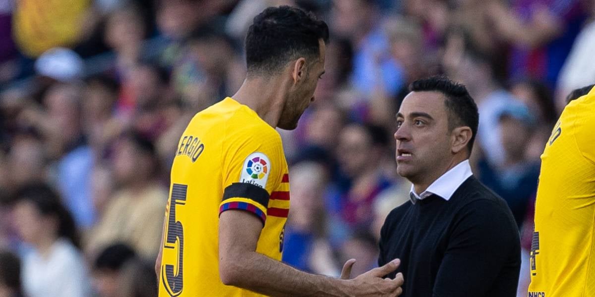 Sergio Busquets y Xavi Hernández, durante un partido | Europa Press