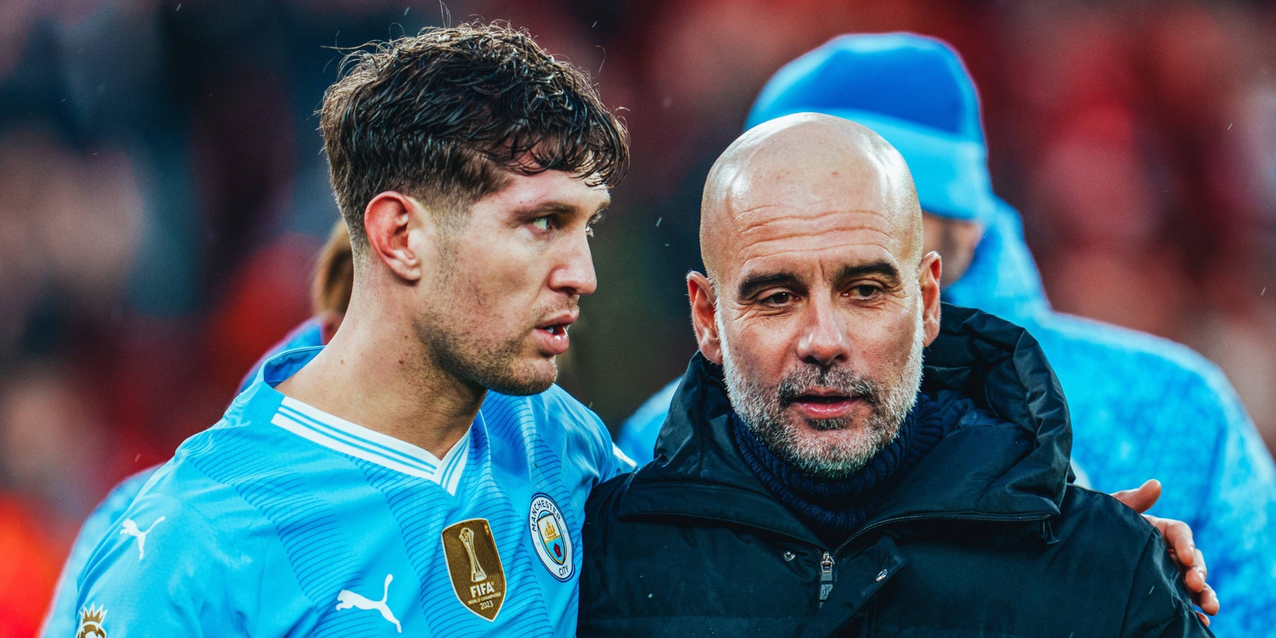 John Stones, jugador del Manchester City, i Pep Guardiola, entrenador de l'equip | Manchester City