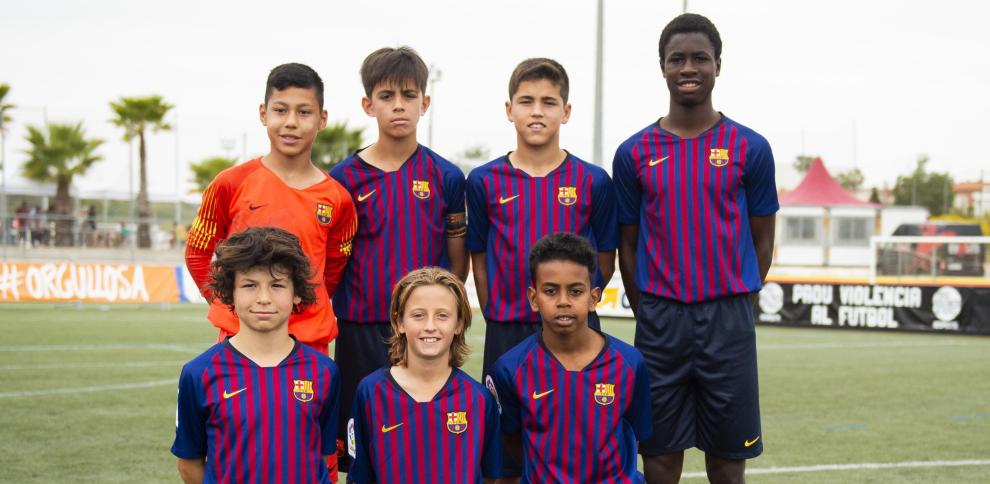 Marc Bernal, Pau Cubarsí i Lamine Yamal, durant un partit a la Masia | FC Barcelona