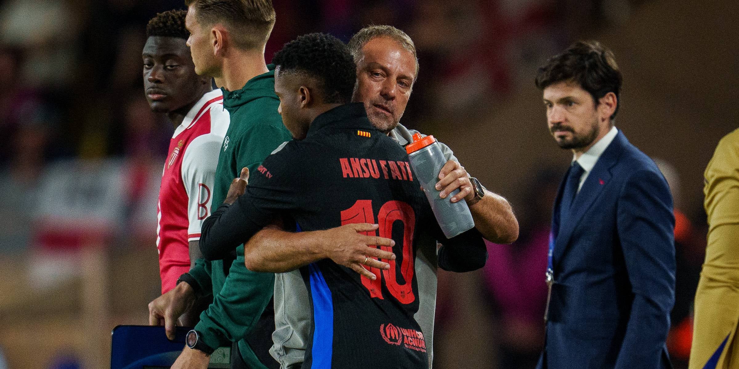 Hansi Flick i Ansu Fati, durant un partit de Champions | FC Barcelona