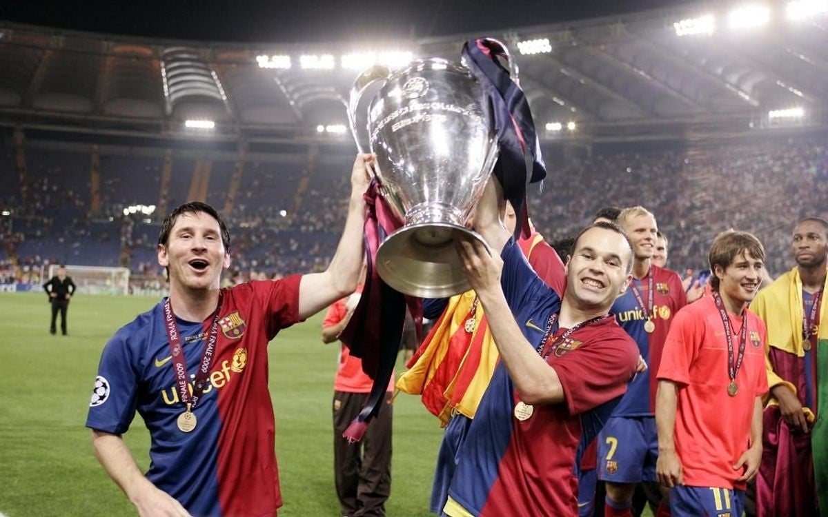 Leo Messi y Andrés Iniesta, con la Champions de 2009 | Europa Press