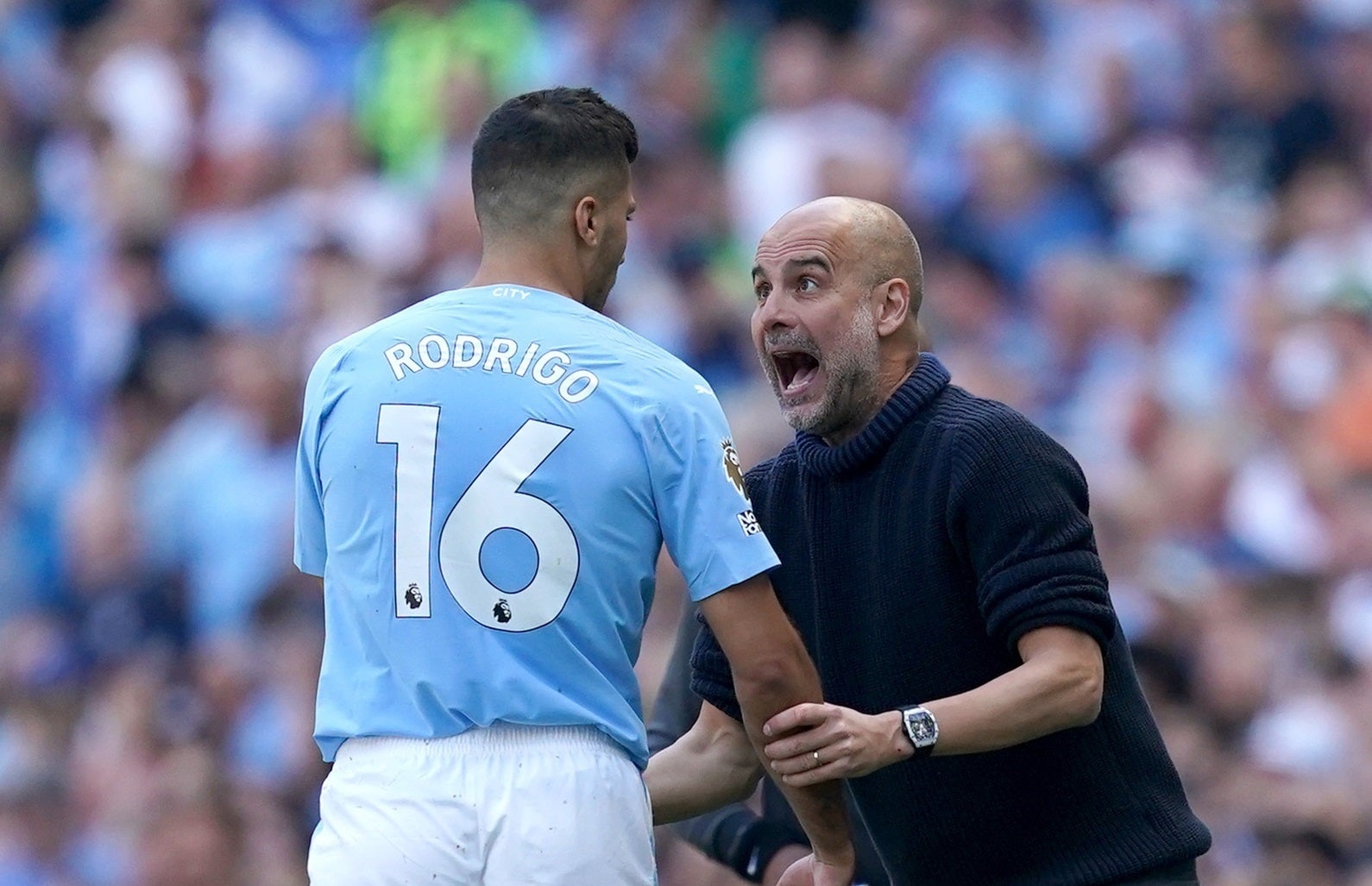 Rodri i Guardiola, durant un partit del Manchester City | Europa Press