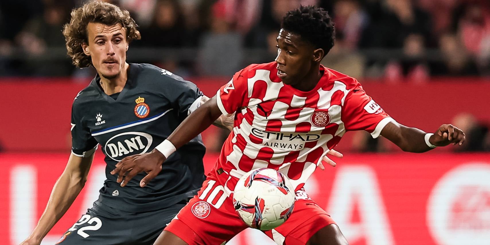 Carlos Romero y Yáser Asprilla, durante el último Girona-Espanyol | Europa Press