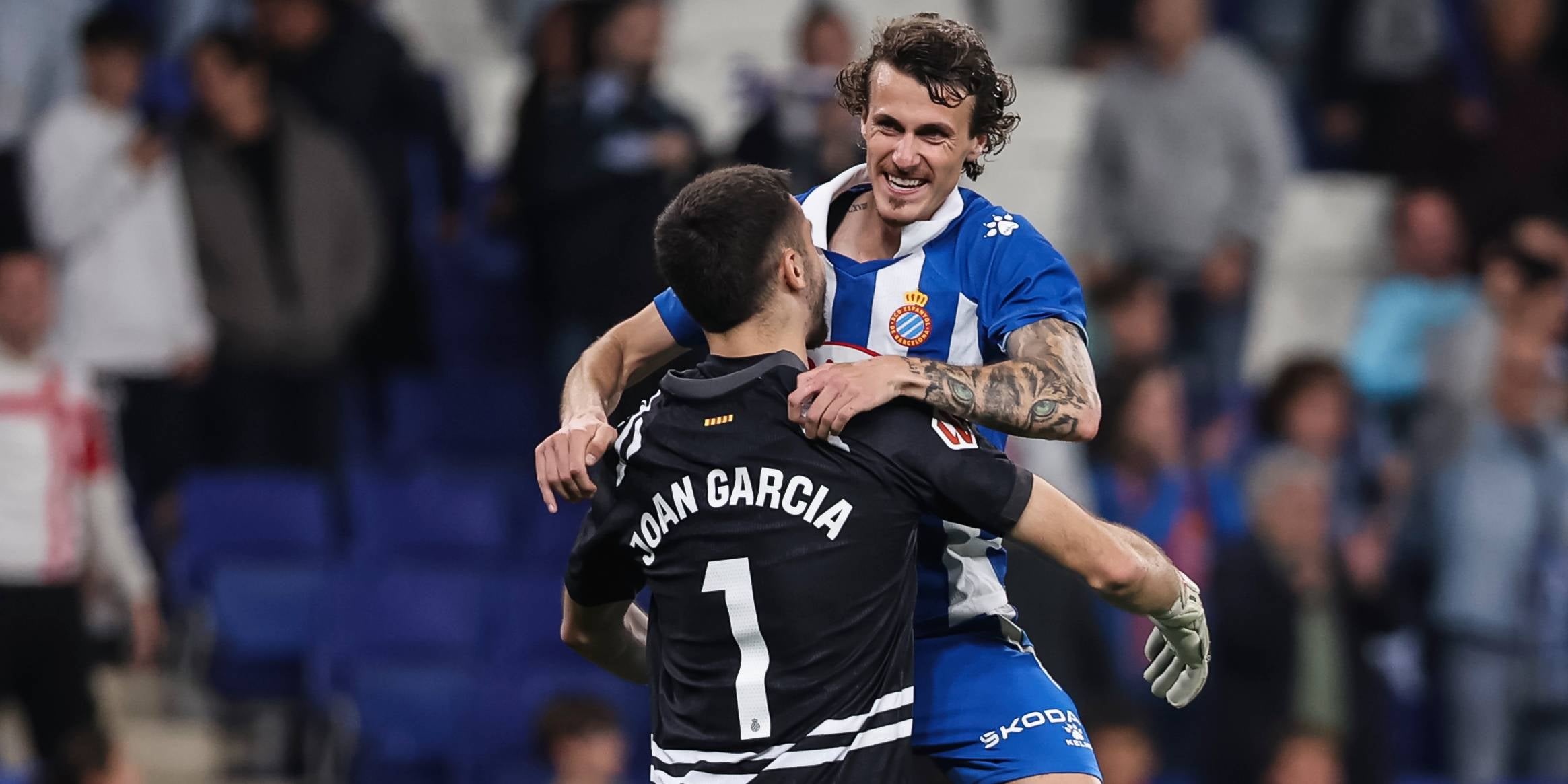 Joan Garcia i Carlos Romero, celebrant una victòria de l'Espanyol | Europa Press