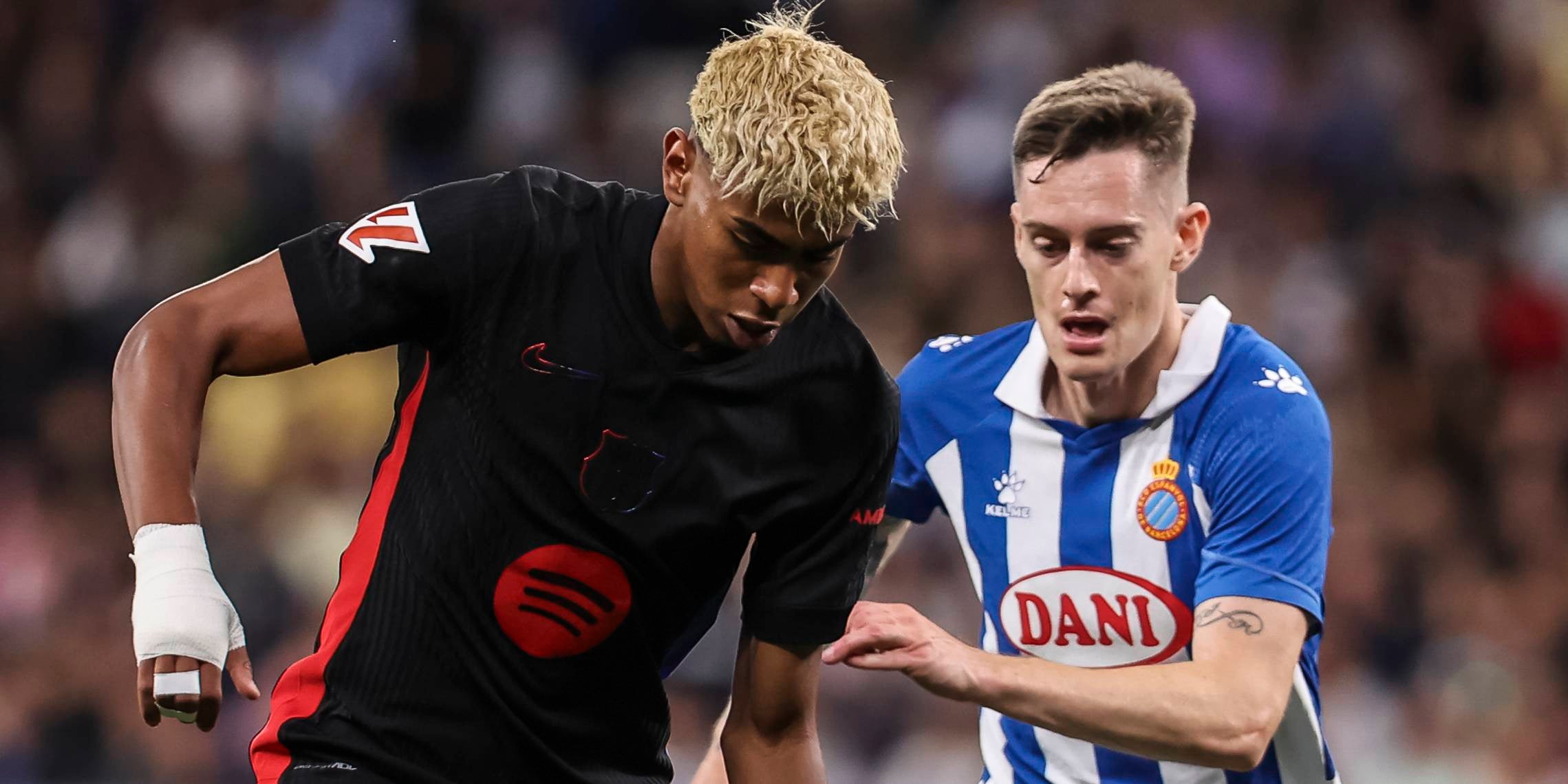 Lamine Yamal i Pol Lozano durant l'Espanyol-Barça de la temporada passada | Europa Press